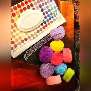 Nine rolls of random colored .88 inch× 10 yrd floral pattern lace ribbon